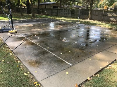 Before concrete cleaning on a dirty play area.